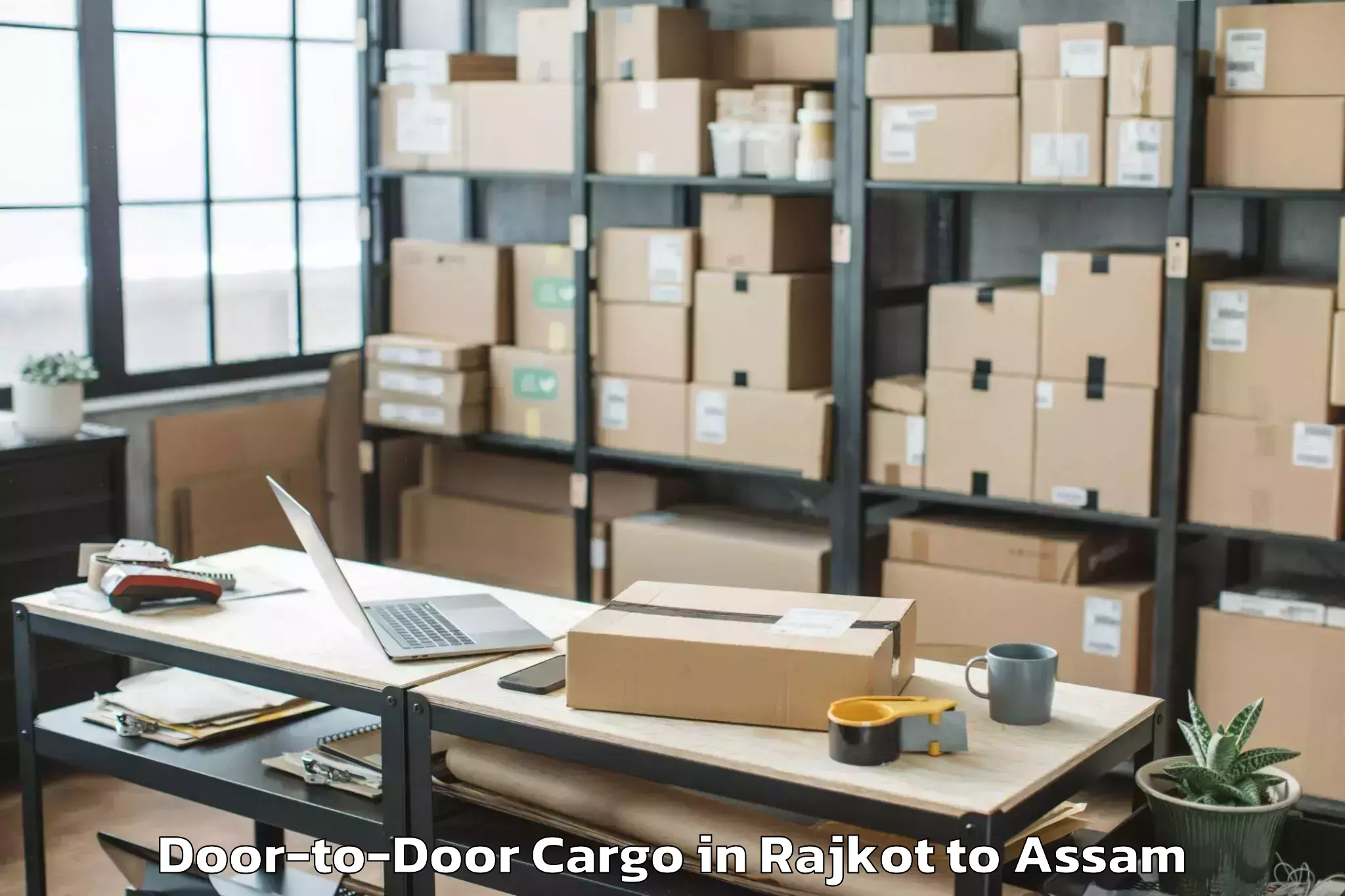 Hassle-Free Rajkot to Sarthebari Door To Door Cargo